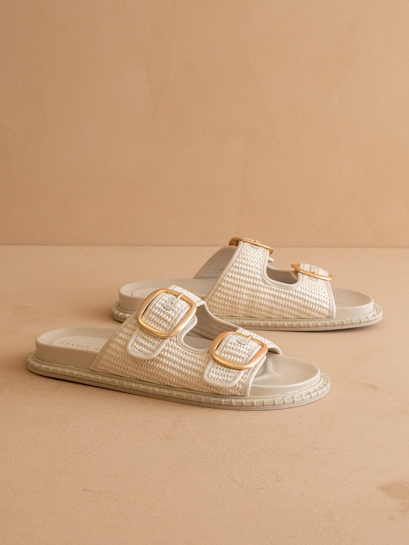 The Daytona Ivory aTwo-Tone Raffia Gold Buckle Sandal