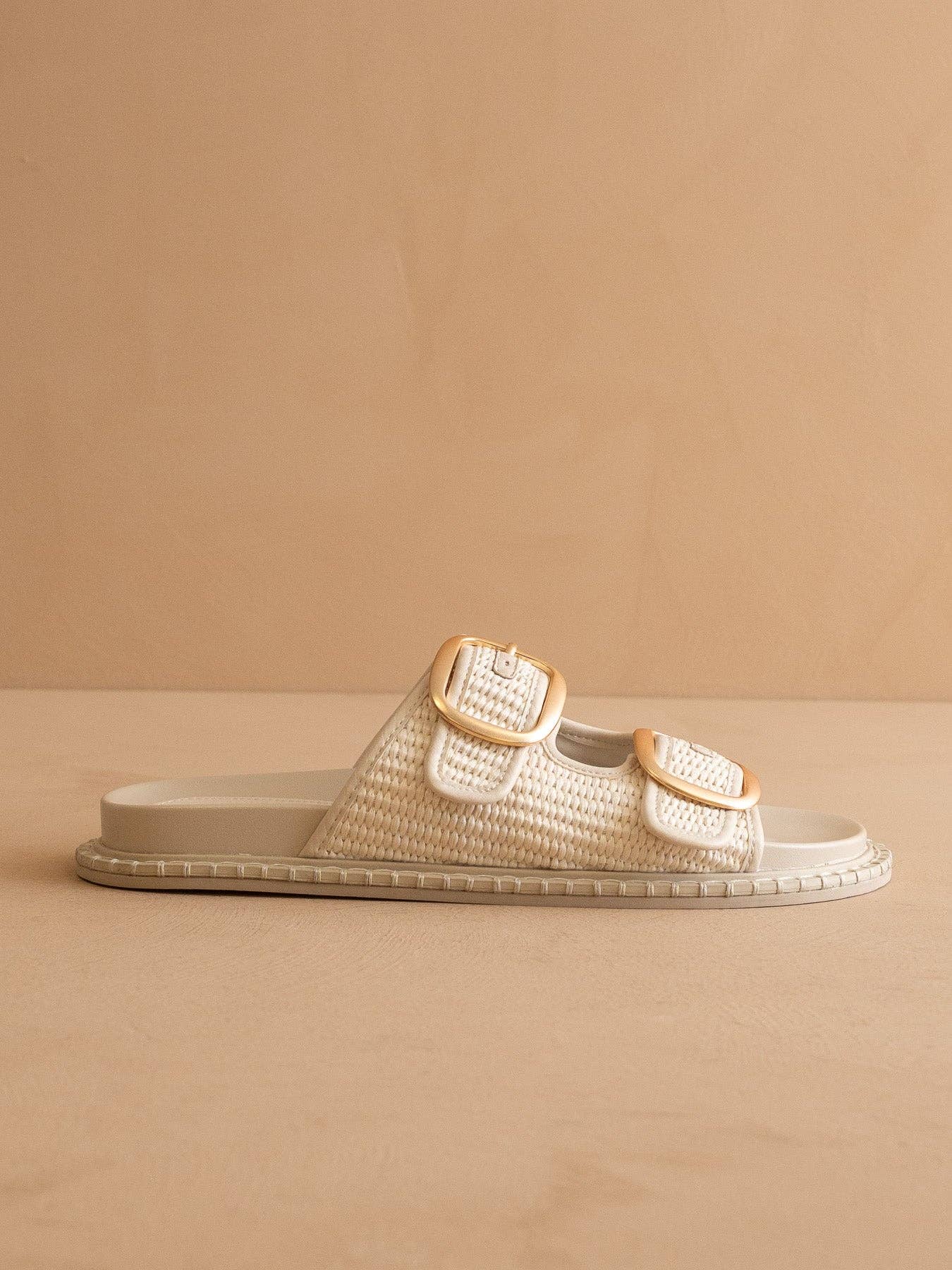 The Daytona Ivory aTwo-Tone Raffia Gold Buckle Sandal